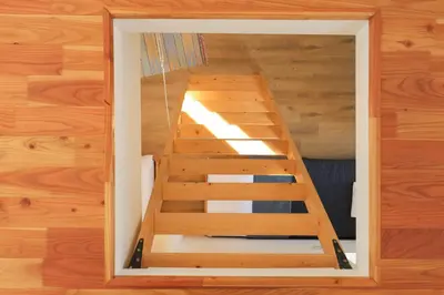 a wooden staircase in a room with wooden floors at Viva Vlasic - Apartman i vikendica in Šišava