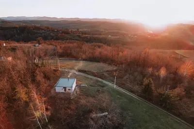 an aerial view of a house in a field at Relax house - Šumska vila romanticni spa apartman sa djakuzijem in Banja Luka