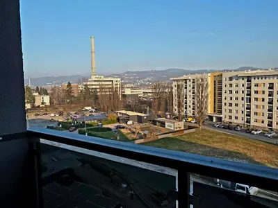 a view of a city from a window at Novicasa in Železnička Stanica Incel