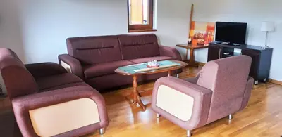 a living room with a couch and chairs and a table at Connect 4 - Vlašić Vikendica in Šišava