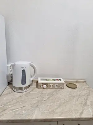a coffee maker sitting on top of a counter at Pollaris in Banja Luka