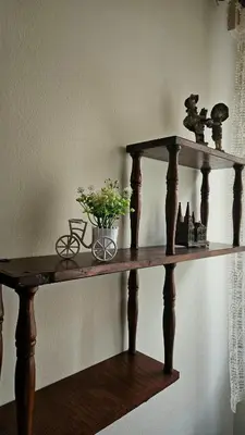 a wooden shelf with a potted plant on it at Stan na dan - Apartman Centar Kakanj in Kakanj
