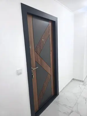 a wooden door in a room with a tile floor at Dora in Bugojno