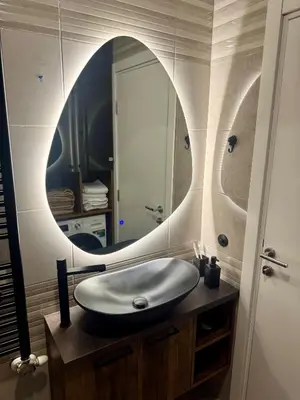 a bathroom with a sink and a mirror at Jelena Apartments in Banja Luka