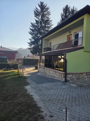a building with a balcony on the side of it at Apartment SOFI Novi Travnik in Novi Travnik