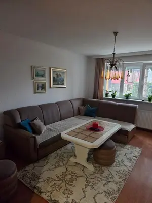 a living room with a couch and a table at Apartment SOFI Novi Travnik in Novi Travnik