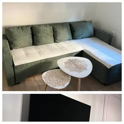 a living room with a couch and a table at Apartman Zvjezdica in Banja Luka