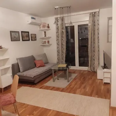a living room with a couch and a table at Ela in Banja Luka