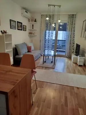 a living room with a couch and a table at Ela in Banja Luka
