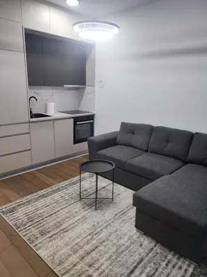 a living room with a couch and a table at Triton in Banja Luka