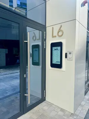 a door on the side of a building at Apartman GrandTrade by Termax in Banja Luka