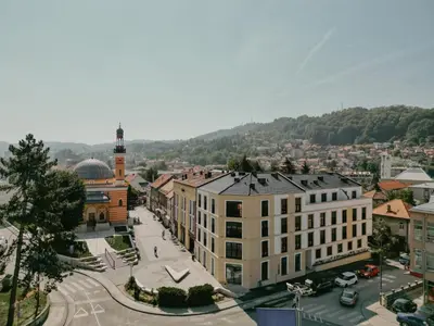 an overhead view of a city with a building at CENTRAL SQUARE Tuzla in Tuzla
