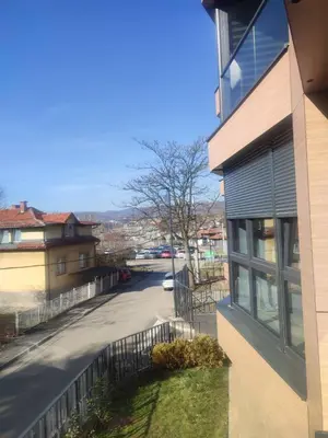 a view of a street next to a building at Banja Residence Apt in Tuzla