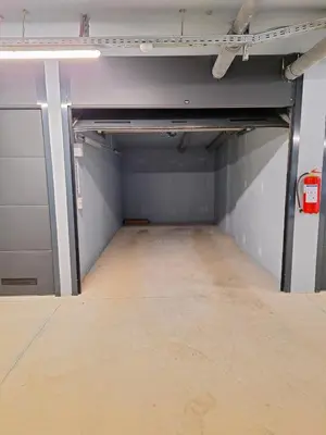 an empty room with a floor in a garage at Banja Residence Apt in Tuzla