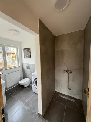 a bathroom with a shower and a toilet at Vlasic Odmor - Villa Amina in Vlasic