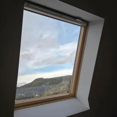 a window with a view of a mountain at MaLi Raj in Vlasic