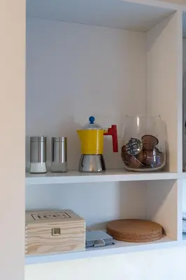 a shelf with a blender and other kitchen items at Apartman Srna in Banja Luka