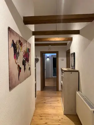 a hallway with a painting on the wall at House in Kreševo - Mountain view - in Kreševo