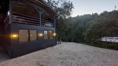 a person is standing outside of a building at Neno Pyramid Wellness Retreat in Visoko