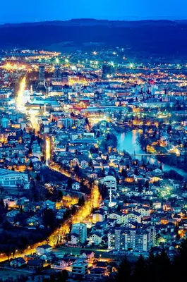 a view of a city lit up at night at Stan na Dan 39- PLAVI in Banja Luka
