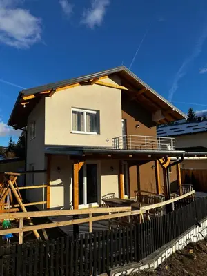 a house with a fence in front of it at Apartment Vlasic in Šišava