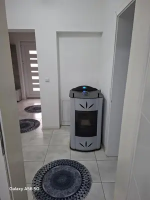 a hallway with a trash can in the middle of a room at Avenue in Bosanska Krupa