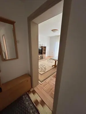 an open door to a room with a hallway at Apartman Andja in Laktaši