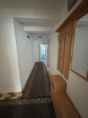 an empty hallway with a stairway in a building at Apartman Andja in Laktaši