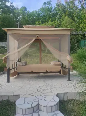a gazebo with a canopy on a patio at Vikendica Popovic in Doboj
