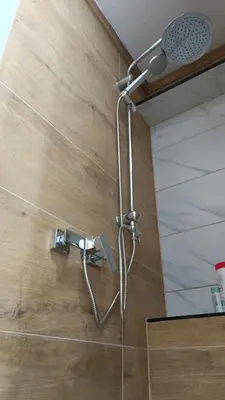 a shower with a shower head on a wall at Galija in Velika Kladuša