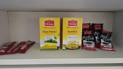 a shelf with three packs of food on it at Apartman Magic in Banja Luka