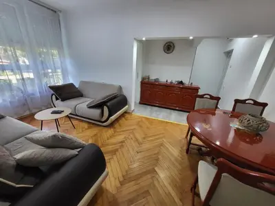 a living room with a couch and a table at Stan na dan Gradiska