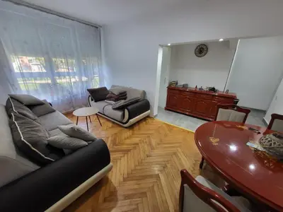a living room with a couch and a table at Stan na dan Gradiska