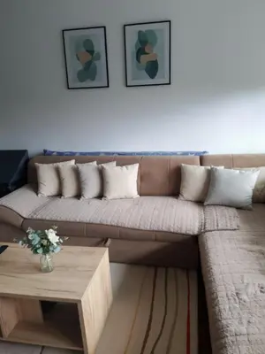 a living room with a couch and a coffee table at Vikendica Brvnička Oaza mir i priroda kraj Šamca