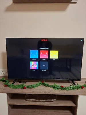 a flat screen tv sitting on top of a table at Stan na dan Čaršija in Gračanica