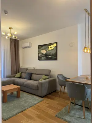 a living room with a couch and a table at D&Ana in Banja Luka