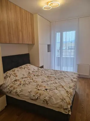 a bedroom with a bed and a window at Stay & Enjoy Apartment in Banja Luka
