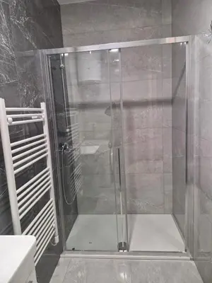 a shower with a glass door in a bathroom at Stay & Enjoy Apartment in Banja Luka