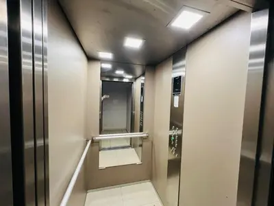 a elevator in a bathroom with a mirror at Apartman Tara 23 in Banja Luka