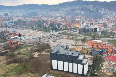 an aerial view of a city with a building at ARIA Luxury Apartment, Tuzla in Tuzla