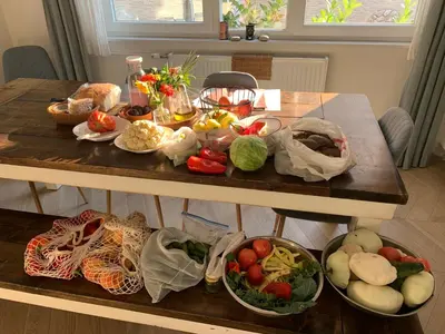 a table with a bunch of fruits and vegetables on it at Large Modern House in Prijedor Bosnia Three Bedrooms Two Full Bathrooms Close to Zagreb EU Border Banja Luka Perfect for Bikers and Families in Prijedor