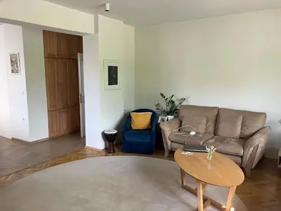 a living room with a couch and a table at Large Modern House in Prijedor Bosnia Three Bedrooms Two Full Bathrooms Close to Zagreb EU Border Banja Luka Perfect for Bikers and Families in Prijedor