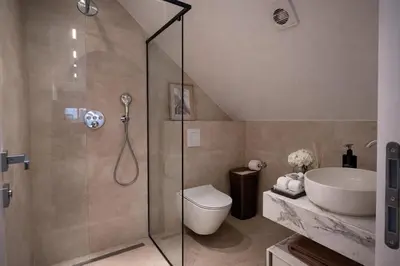 a bathroom with a shower and a toilet and a sink at BERLINA RESIDENCE Luxury Apartment in Bihać