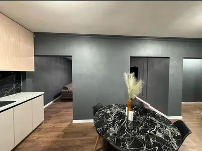 a kitchen with a table with a plant on it at Villa Luxury Crystal center in Bihać