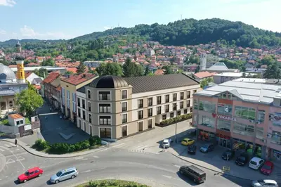 an overhead view of a city with a street at Premium Skver Tuzla - City Center in Tuzla