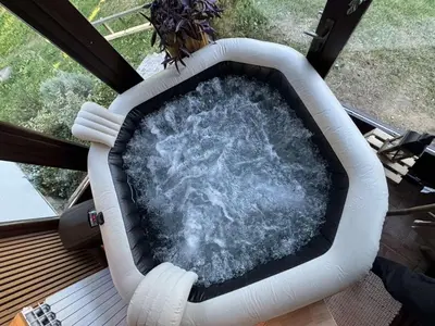 a pool of water in an inflatablevisor on a balcony at Residence Green Pool & SPA in Visoko