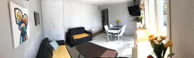 a living room with a couch and a table at Vlašić House in Vlasic