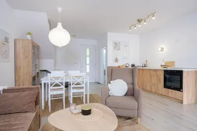 a living room with a couch and a table at Piramida Visoko in Visoko