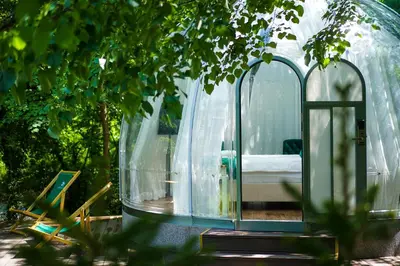 a dome tent with a mirror in a garden at Japodski otoci in Račić