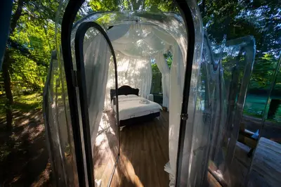 a bedroom with a bed in a canopy at Japodski otoci in Račić